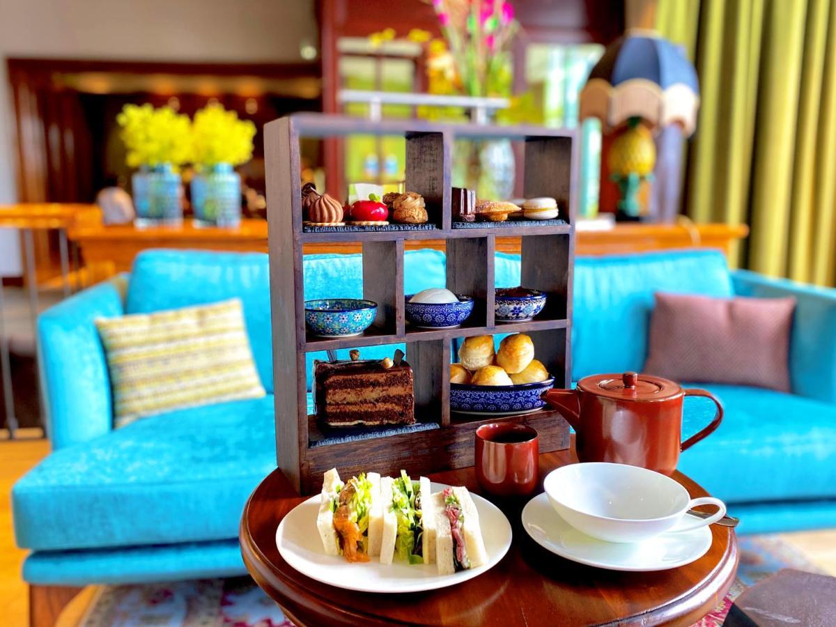 Das James Фленсбург Экстерьер фото Afternoon tea at the Imperial Hotel, Hanoi, Vietnam
